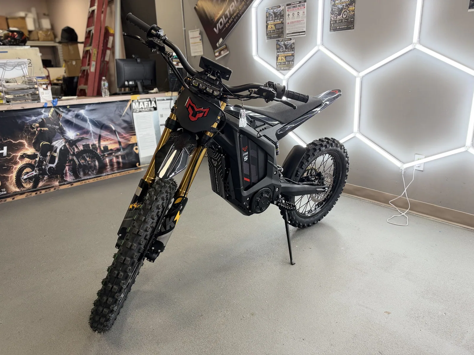 Arctic Leopard XE Pro S Enduro electric dirt bike front three-quarter view at VoltRush USA