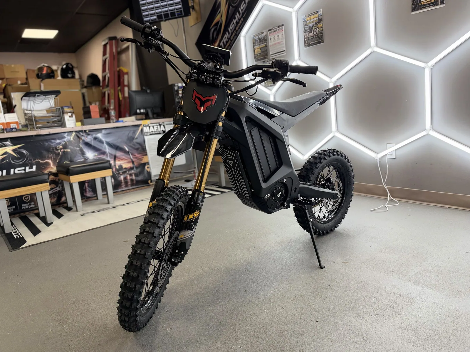 Arctic Leopard XF electric dirt bike front three-quarter view at VoltRush USA
