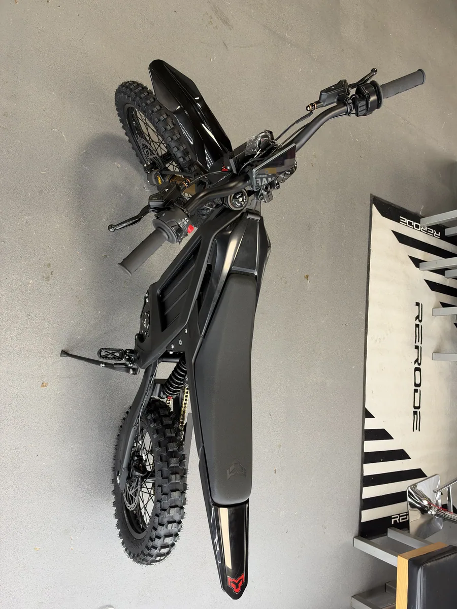 Arctic Leopard XF electric dirt bike overhead view at VoltRush USA