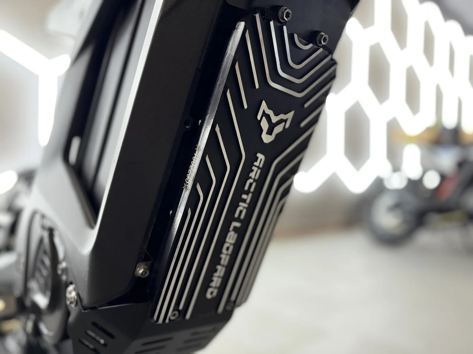 Arctic Leopard XF electric dirt bike battery cover detail