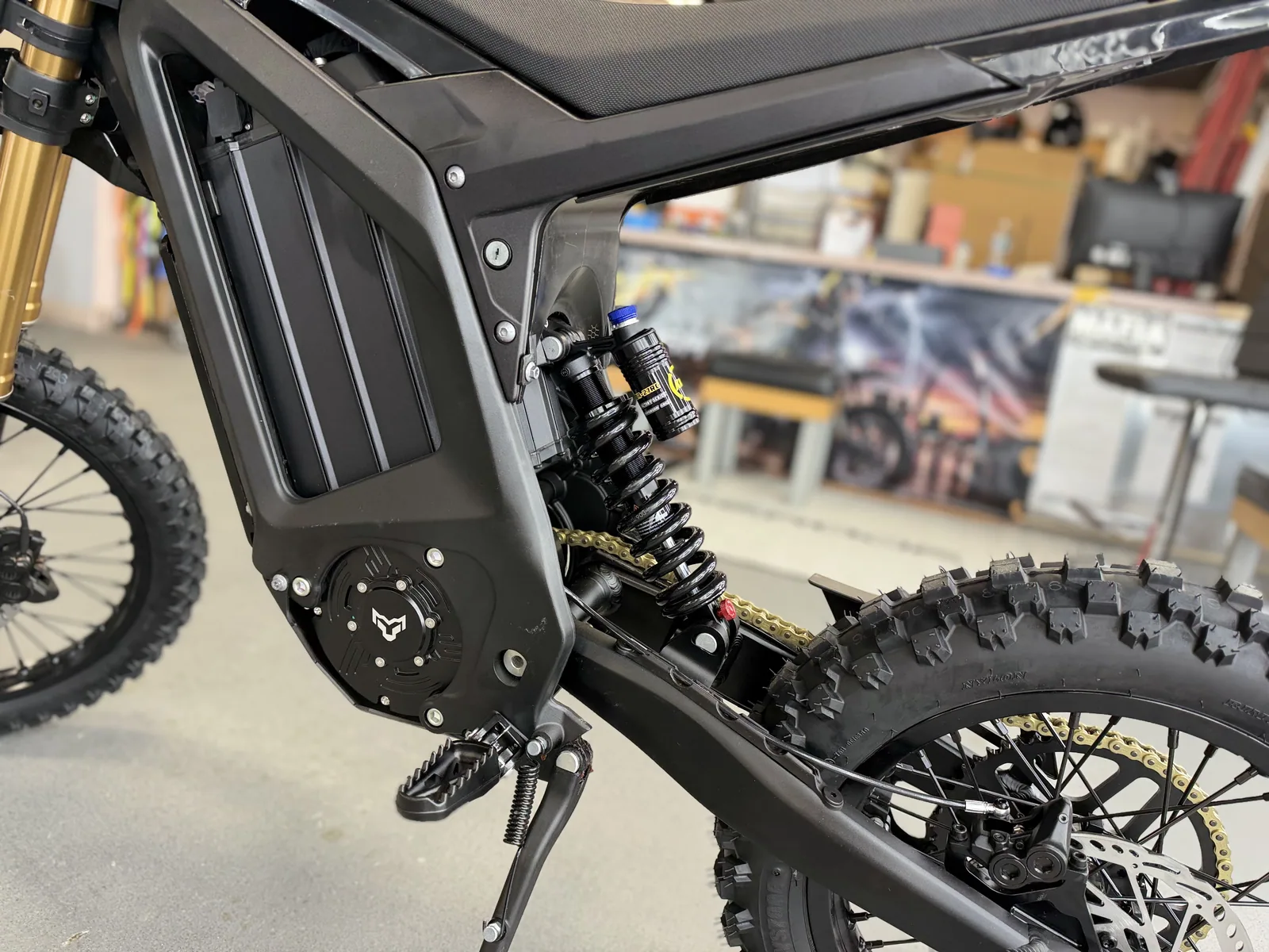 Arctic Leopard XF electric dirt bike frame and rear shock detail