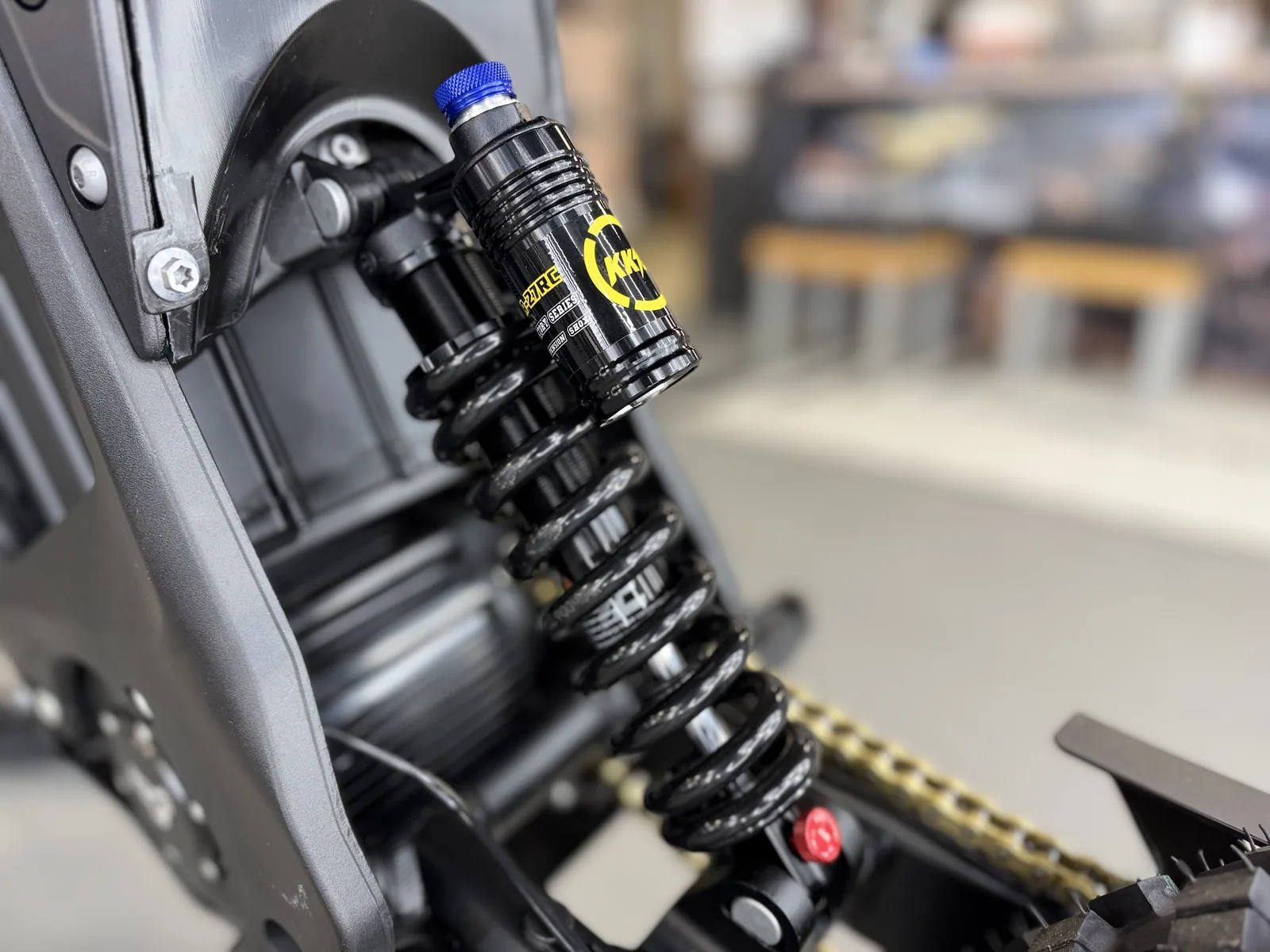 Arctic Leopard XF electric dirt bike rear shock detail