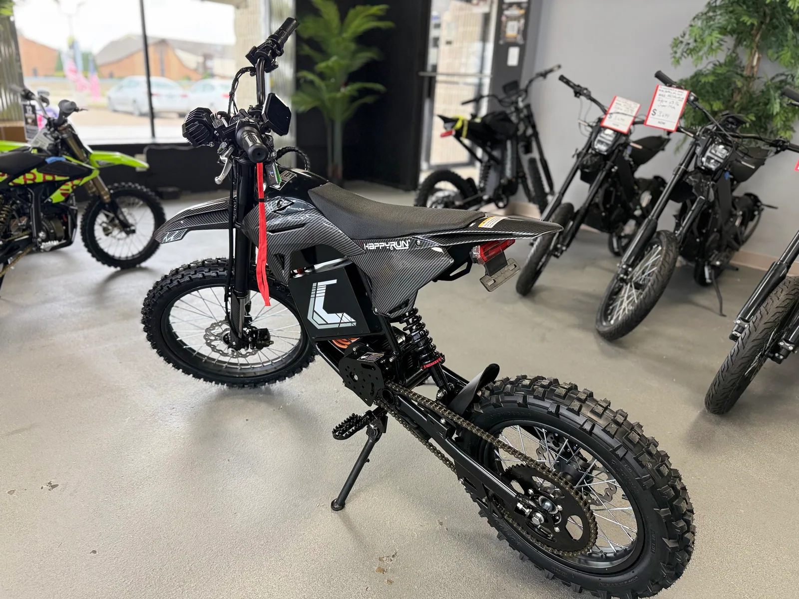 HappyRun F18 2.0 electric dirt bike side detail at VoltRush USA