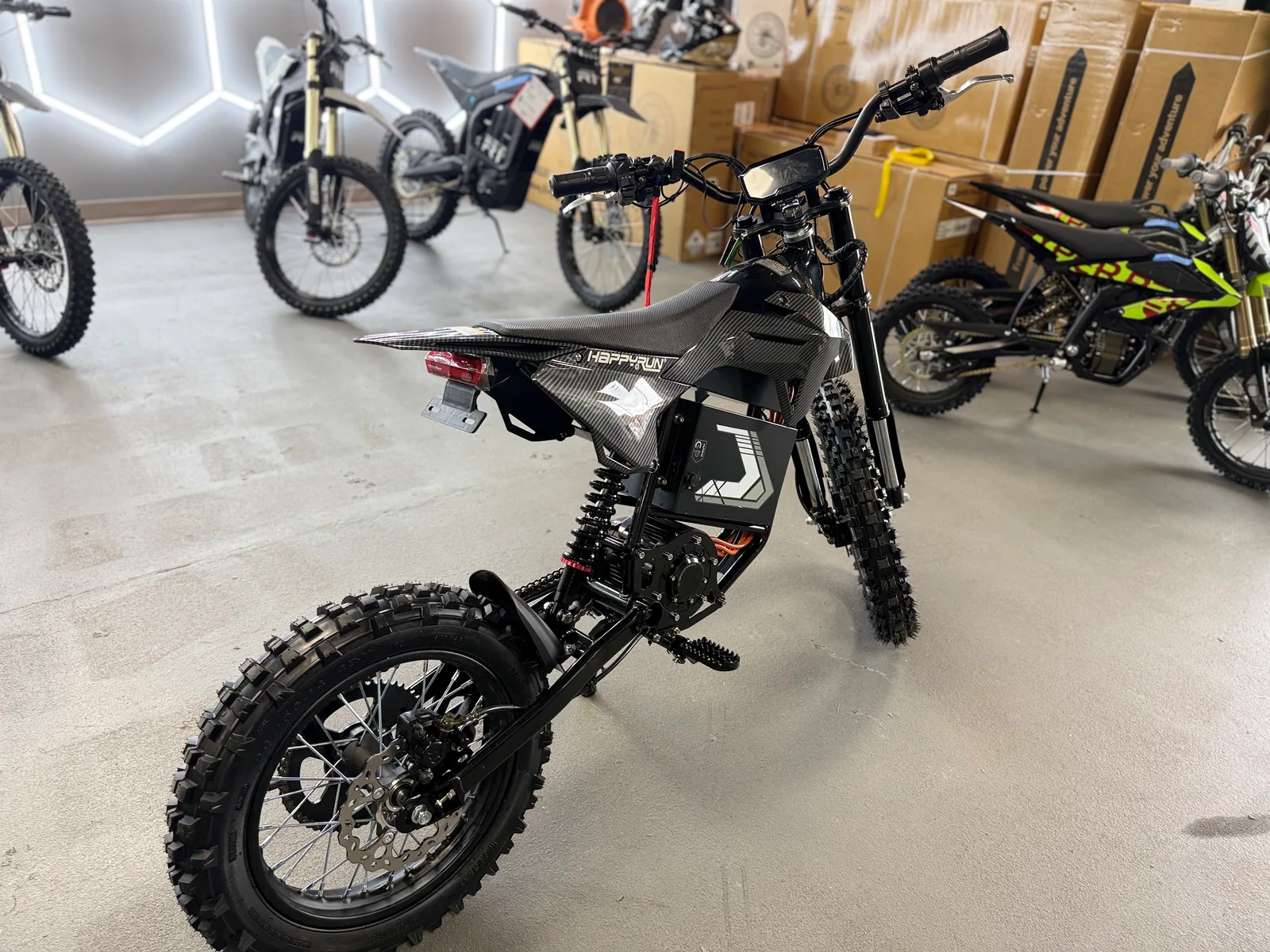 HappyRun F18 2.0 electric dirt bike rear three-quarter view at VoltRush USA