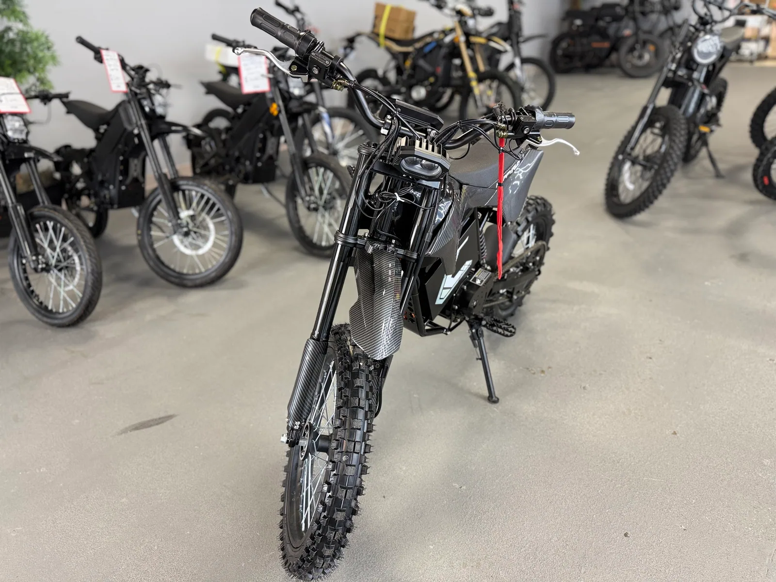 HappyRun F18 2.0 electric dirt bike front wheel and suspension detail