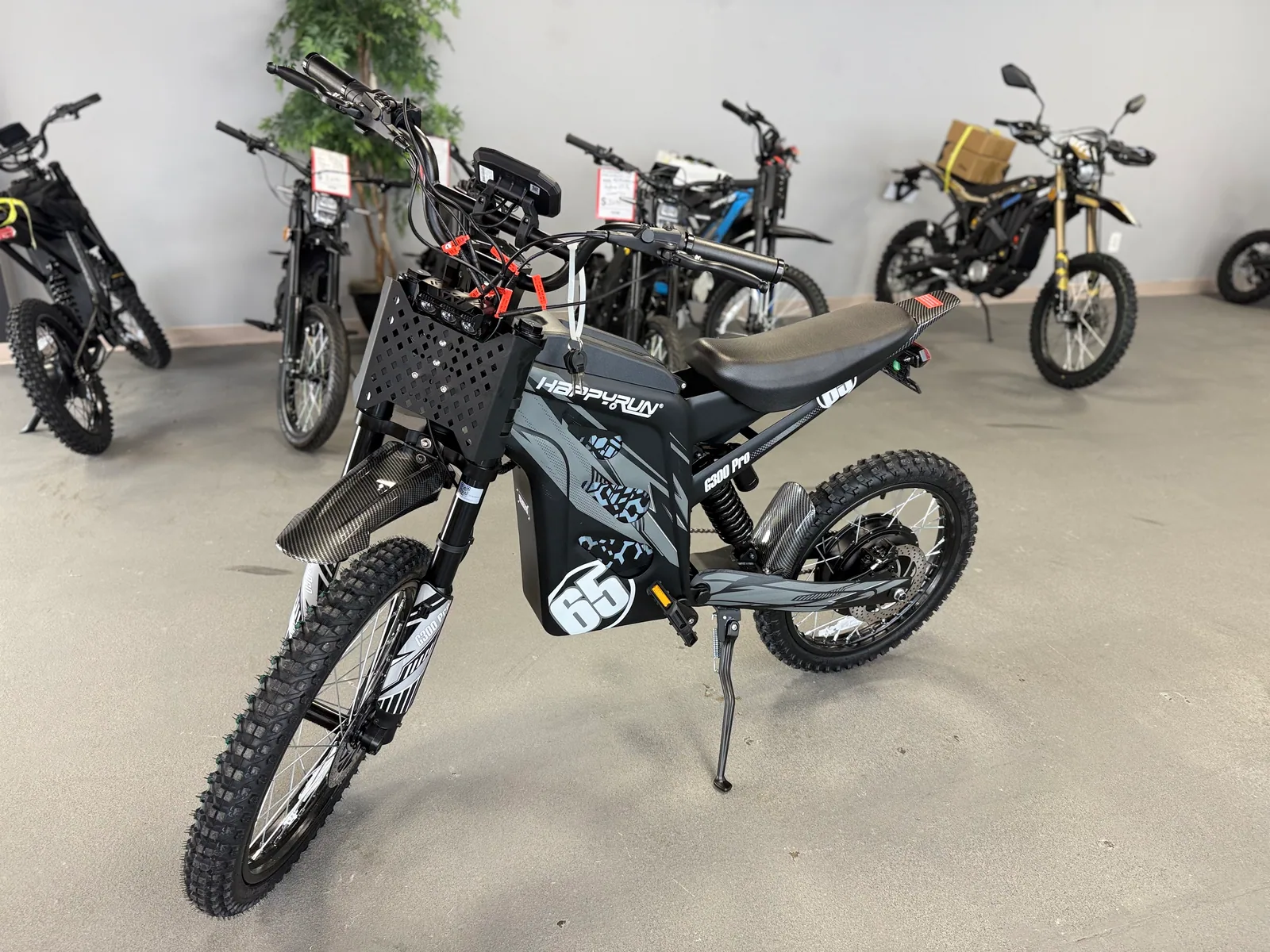 Black HappyRun G300 Pro electric dirt bike front three-quarter view at VoltRush USA