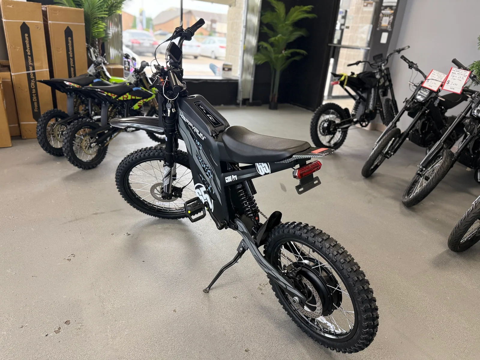 Black HappyRun G300 Pro electric dirt bike side view at VoltRush USA