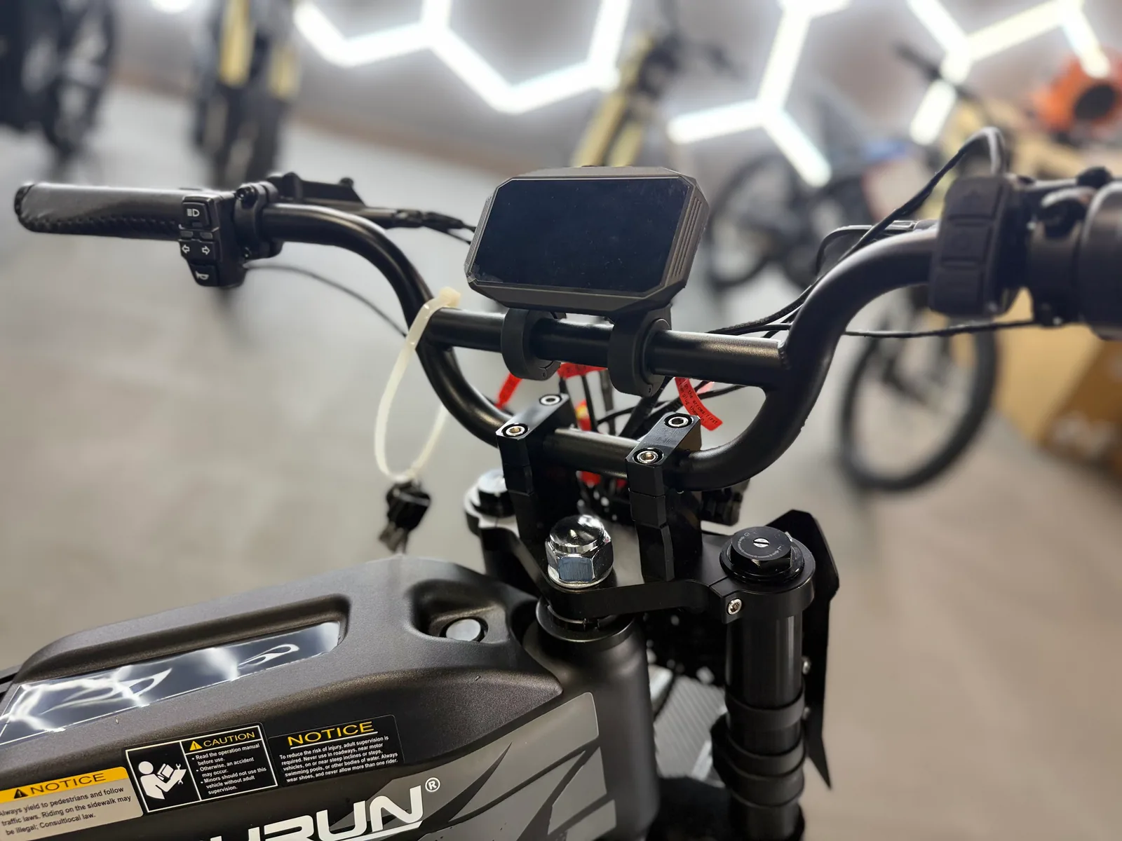 Black HappyRun G300 Pro electric dirt bike rear three-quarter view at VoltRush USA