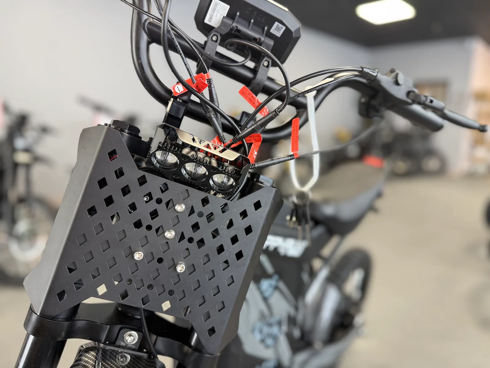 Black HappyRun G300 Pro electric dirt bike battery and frame detail