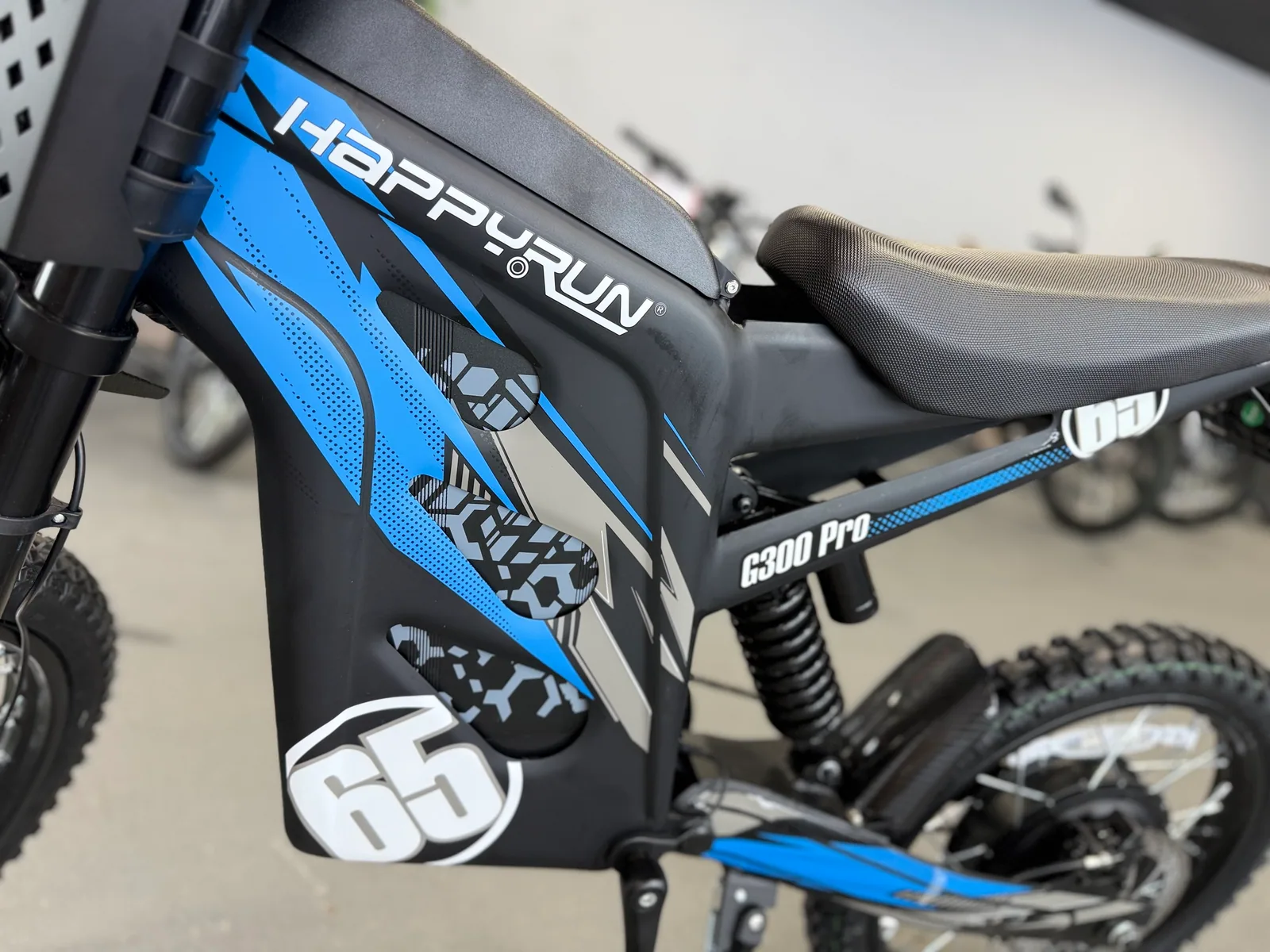 Blue HappyRun G300 Pro electric dirt bike alternate front view at VoltRush USA