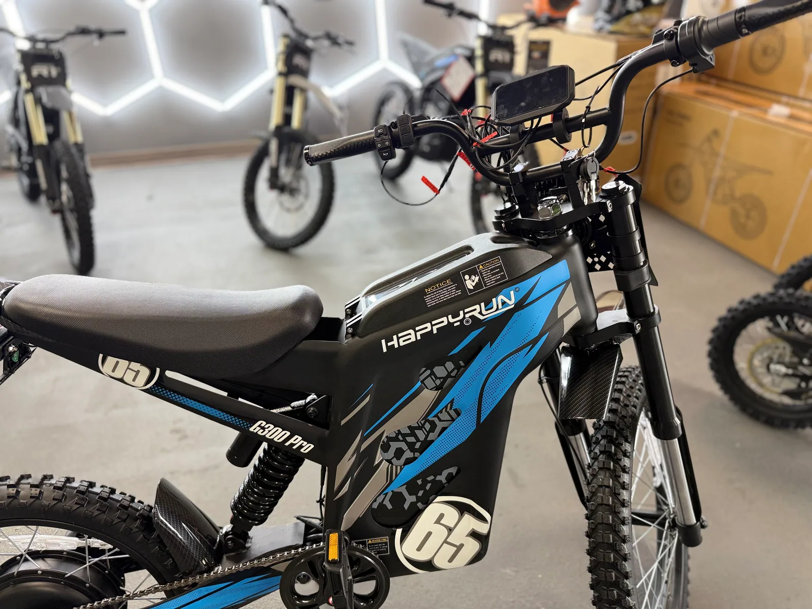 Blue HappyRun G300 Pro electric dirt bike side view at VoltRush USA