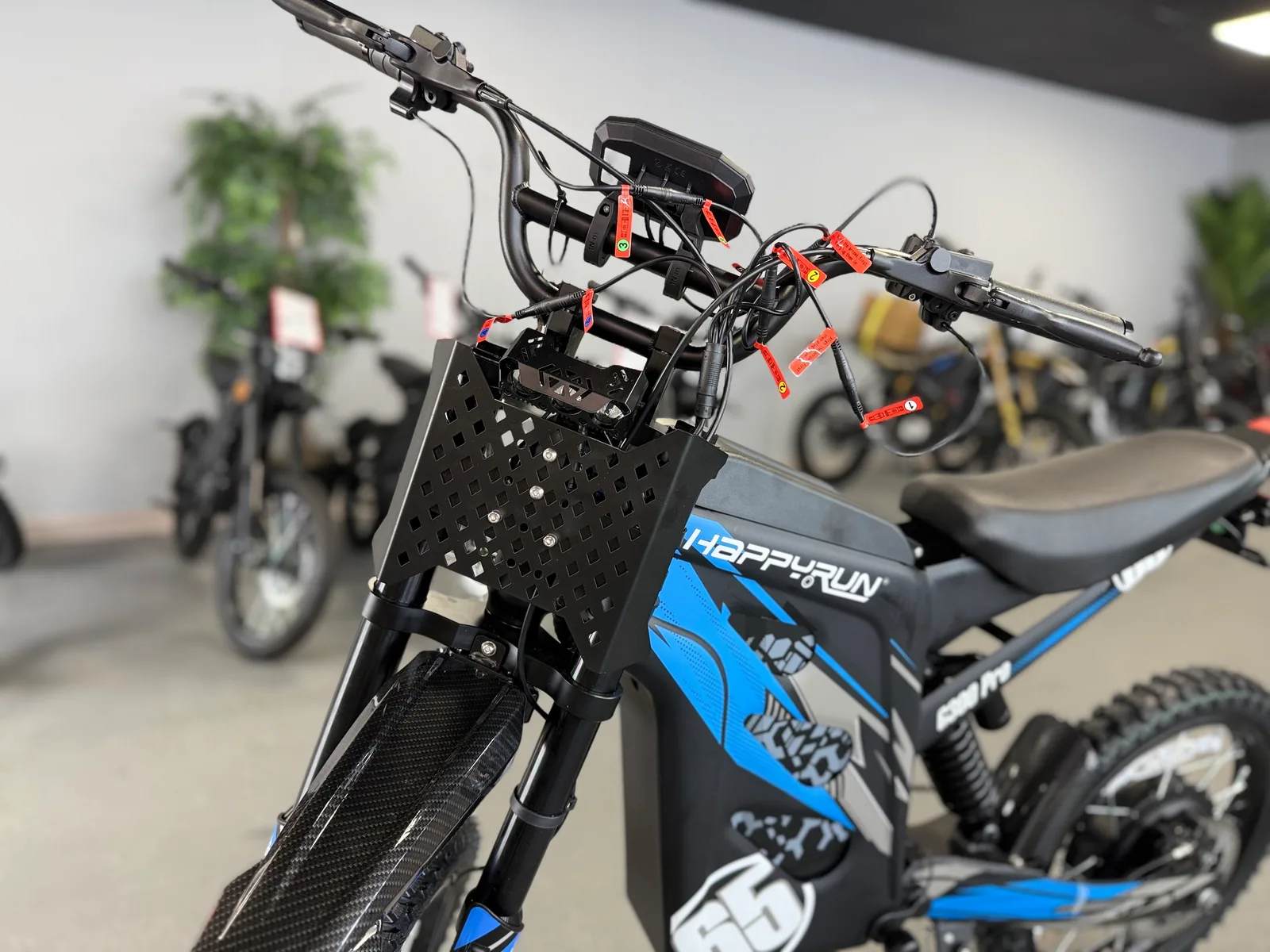 Blue HappyRun G300 Pro electric dirt bike cockpit and controls detail