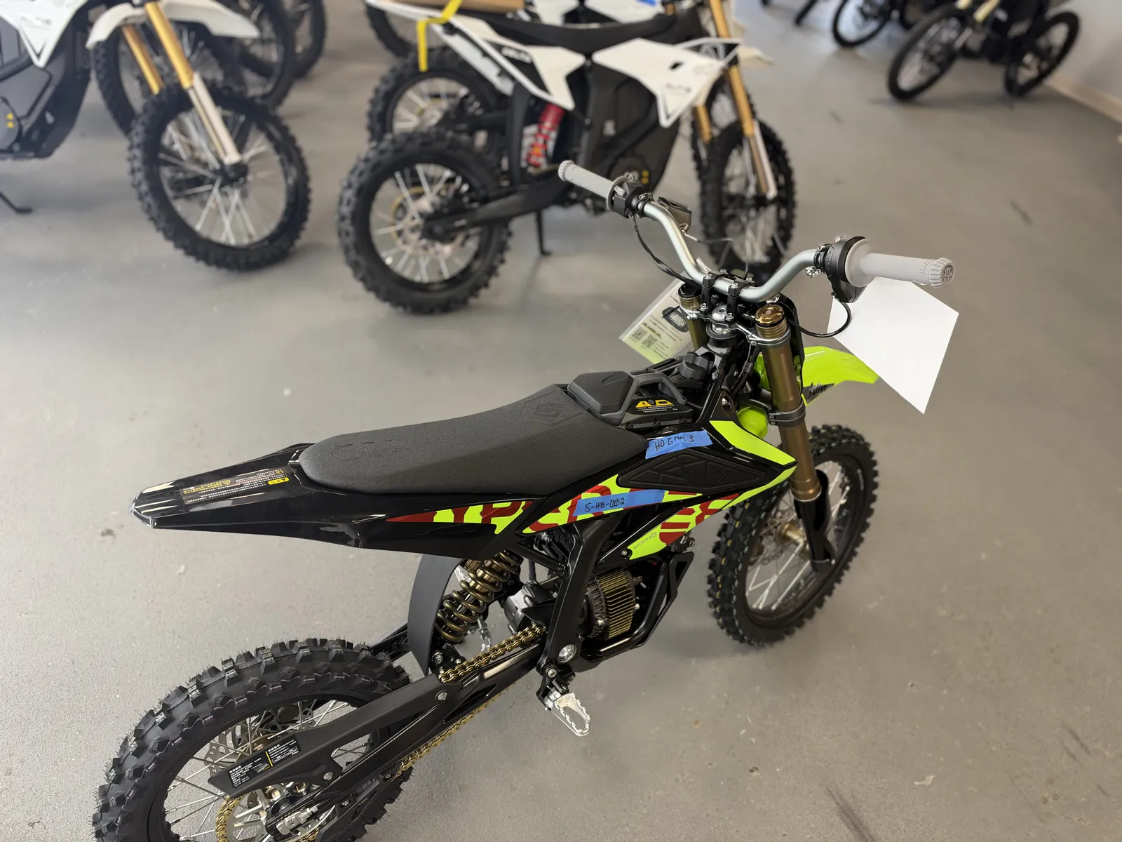 Surron Hyper Bee electric dirt bike at the VoltRush USA showroom, photo 3