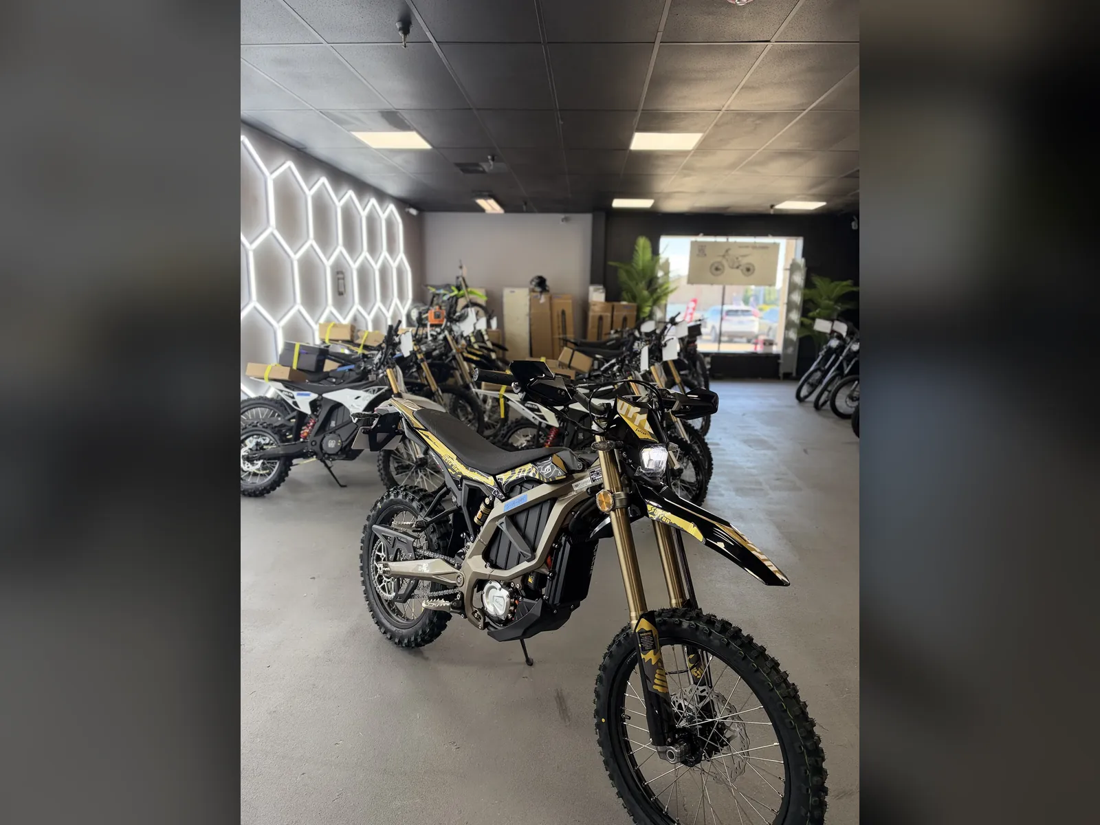 Surron Ultra Bee electric dirt bike at the VoltRush USA showroom, photo 2