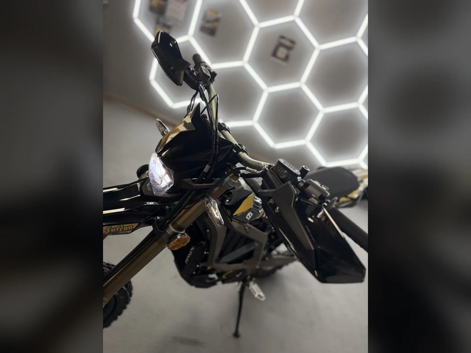 Surron Ultra Bee electric dirt bike at the VoltRush USA showroom, photo 5