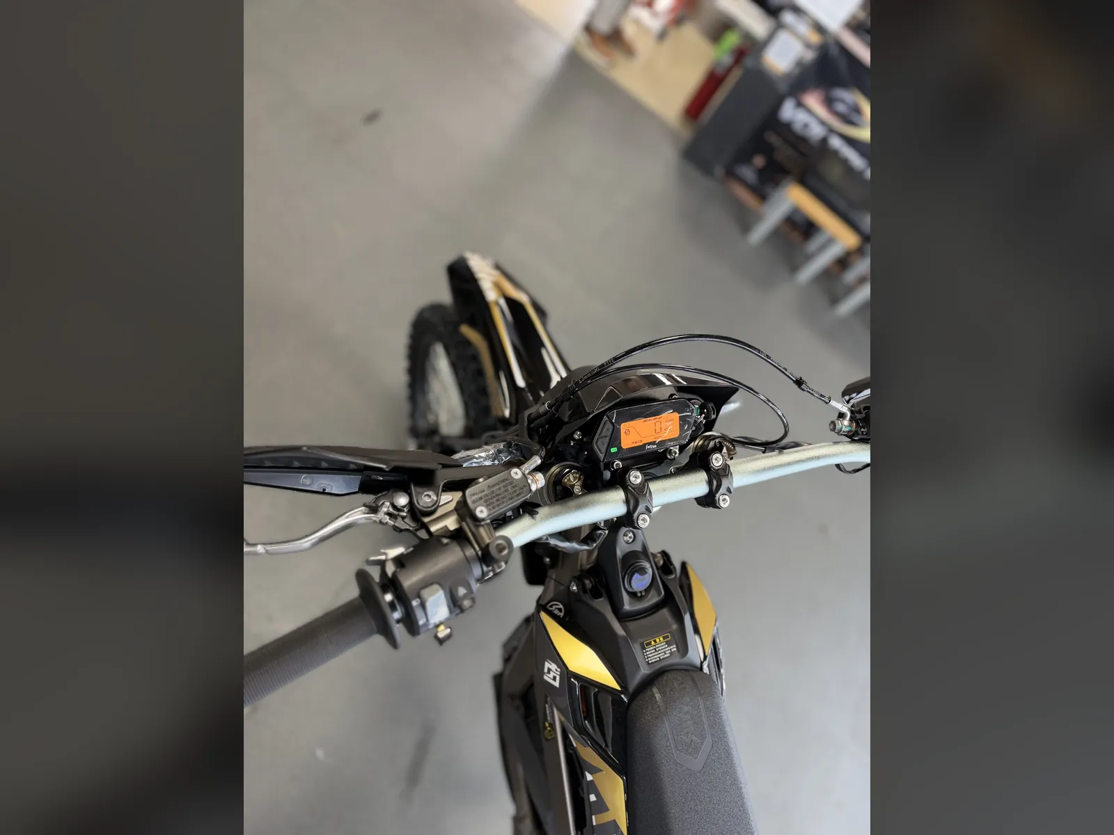 Surron Ultra Bee electric dirt bike at the VoltRush USA showroom, photo 6