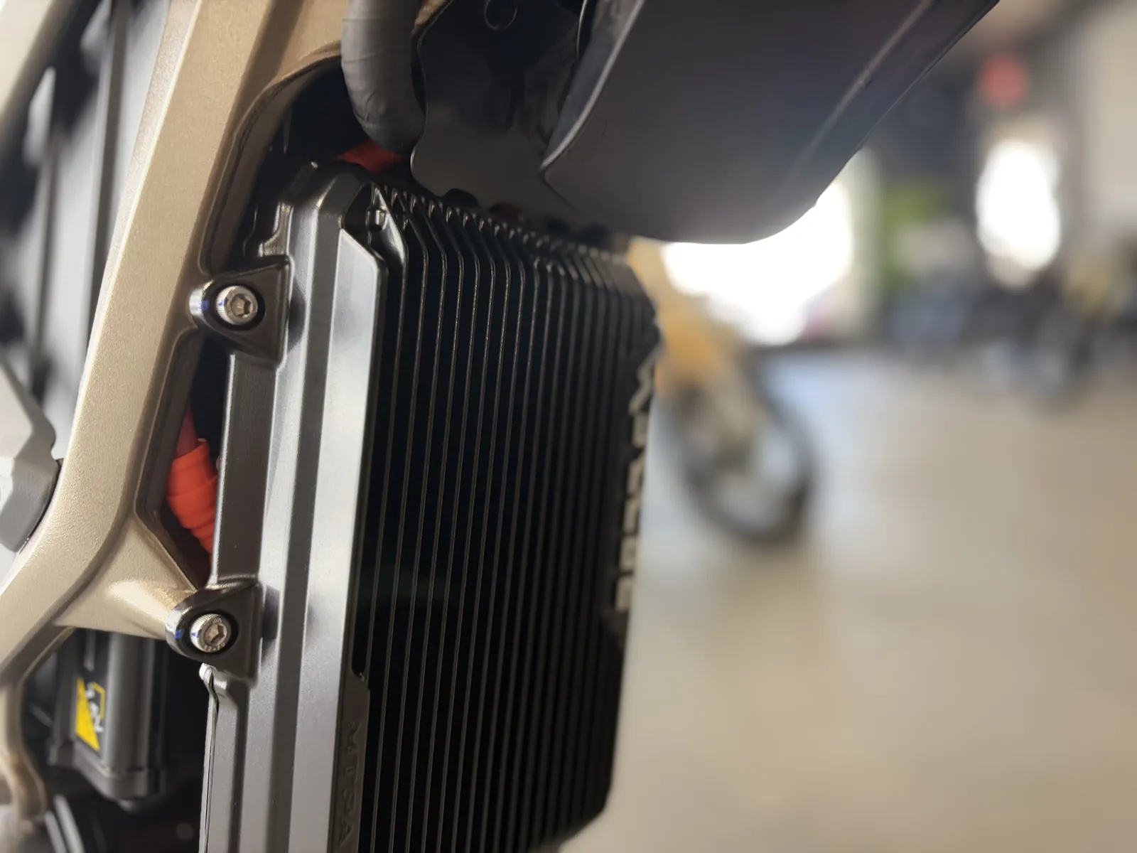 Surron Ultra Bee electric dirt bike at the VoltRush USA showroom, photo 12