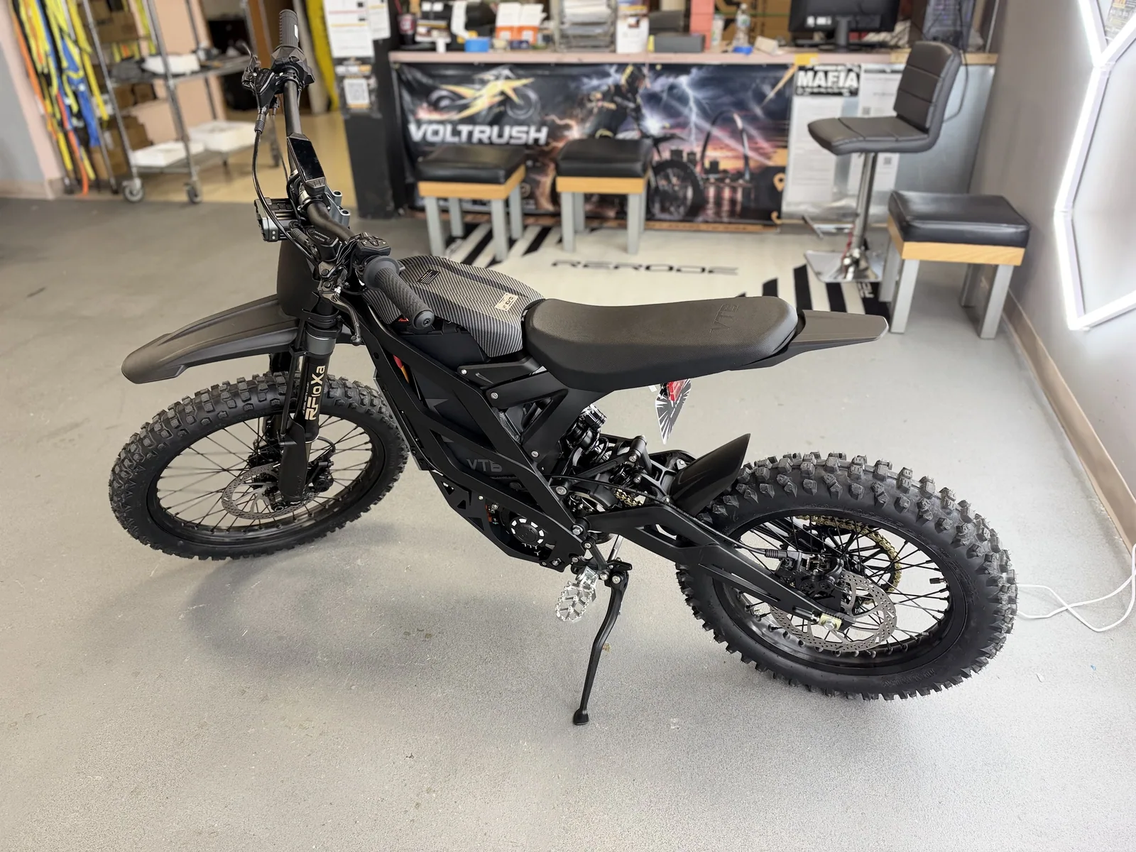 Ventus V1+ EVO electric dirt bike rear three-quarter view at VoltRush USA
