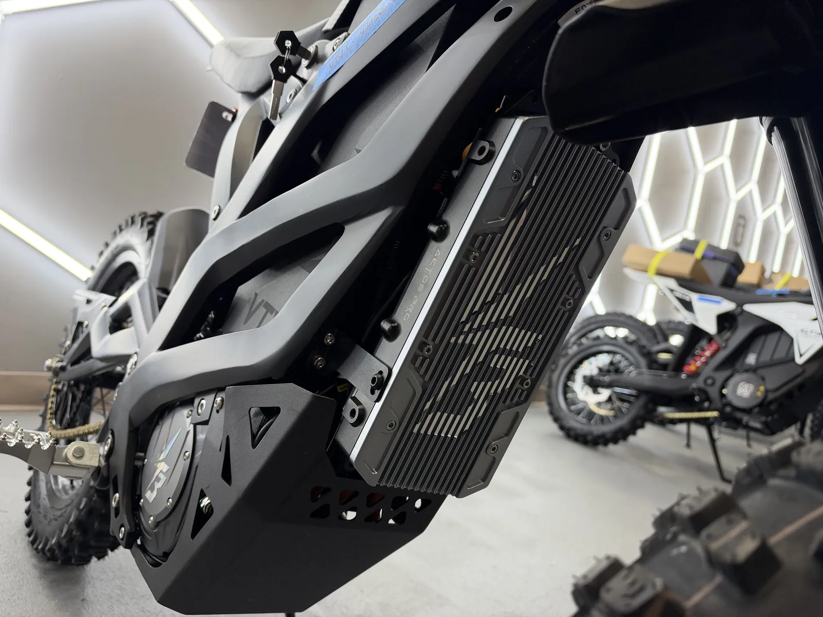 Ventus V1+ EVO electric dirt bike front frame and side cover detail