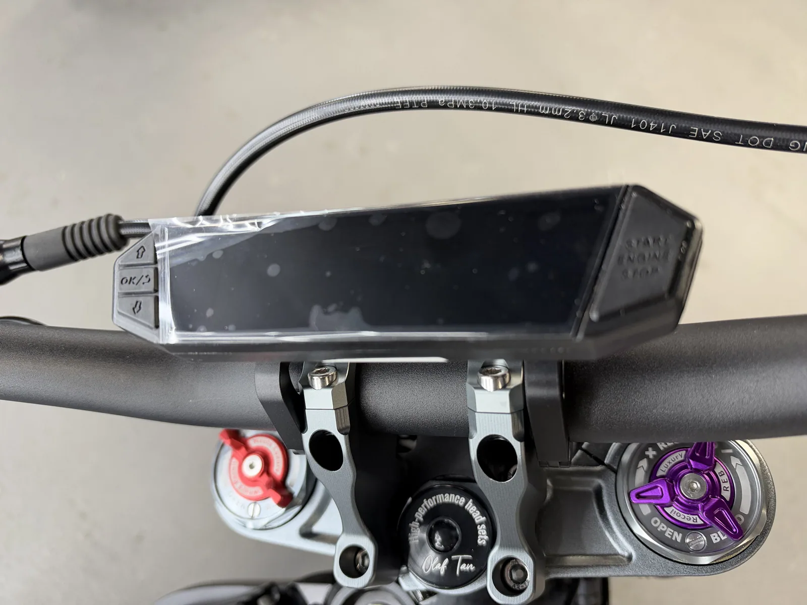 Ventus V1+ EVO electric dirt bike display and triple clamp detail